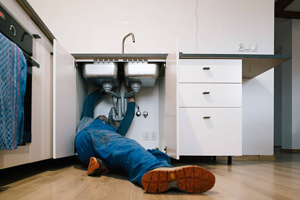 Professional Emergency Plumber technician working in Delavan, WI